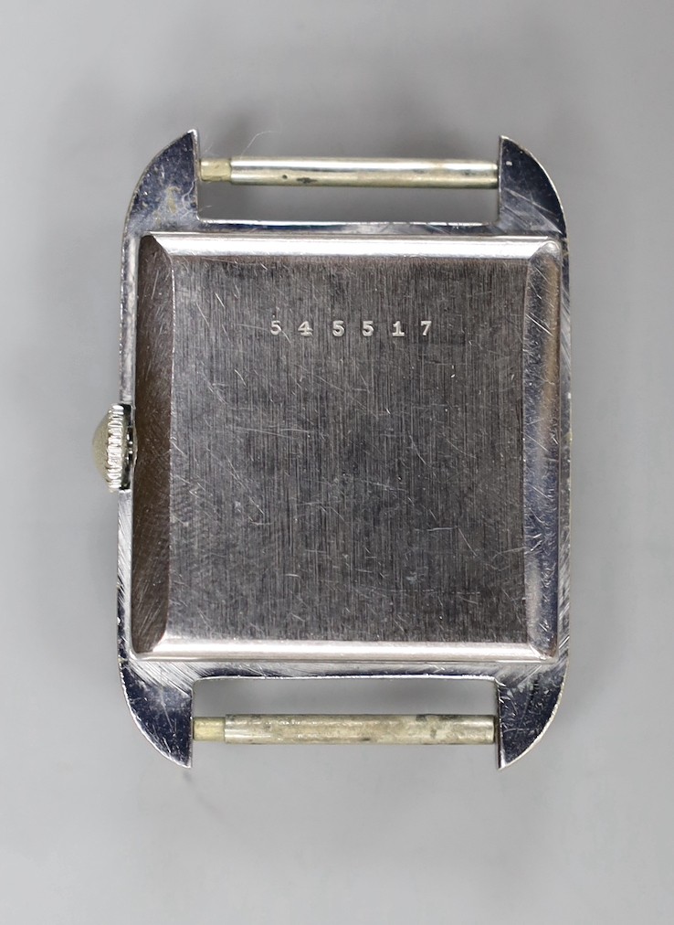 A gentleman's steel Rotary manual wind rectangular wrist watch, with Arabic dial, no strap, case diameter 28mm.